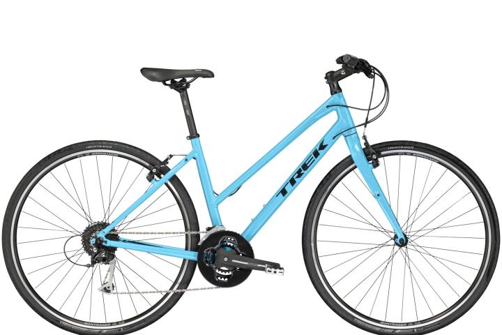 a bicycle leaning against a wall